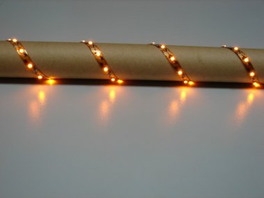 Фотография товара 'Flesi Герметичная гибкая лента IP67 (печатная плата залита силиконом, в резиновом кожухе) с клеевым скотчем 3М Ultra light FLEX-SWP5300A-Y IP67, 11021'